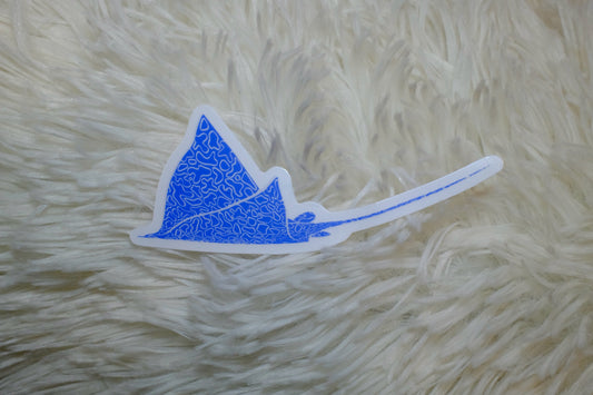 &BEYOND Eagle Ray Swimming vinyl sticker displayed flat on a wood table.